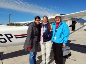 Pilot Alan Hoffberg with passenger Tereza M. and her companion, Darlene C.