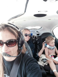 Andy R. with Mom and pilot